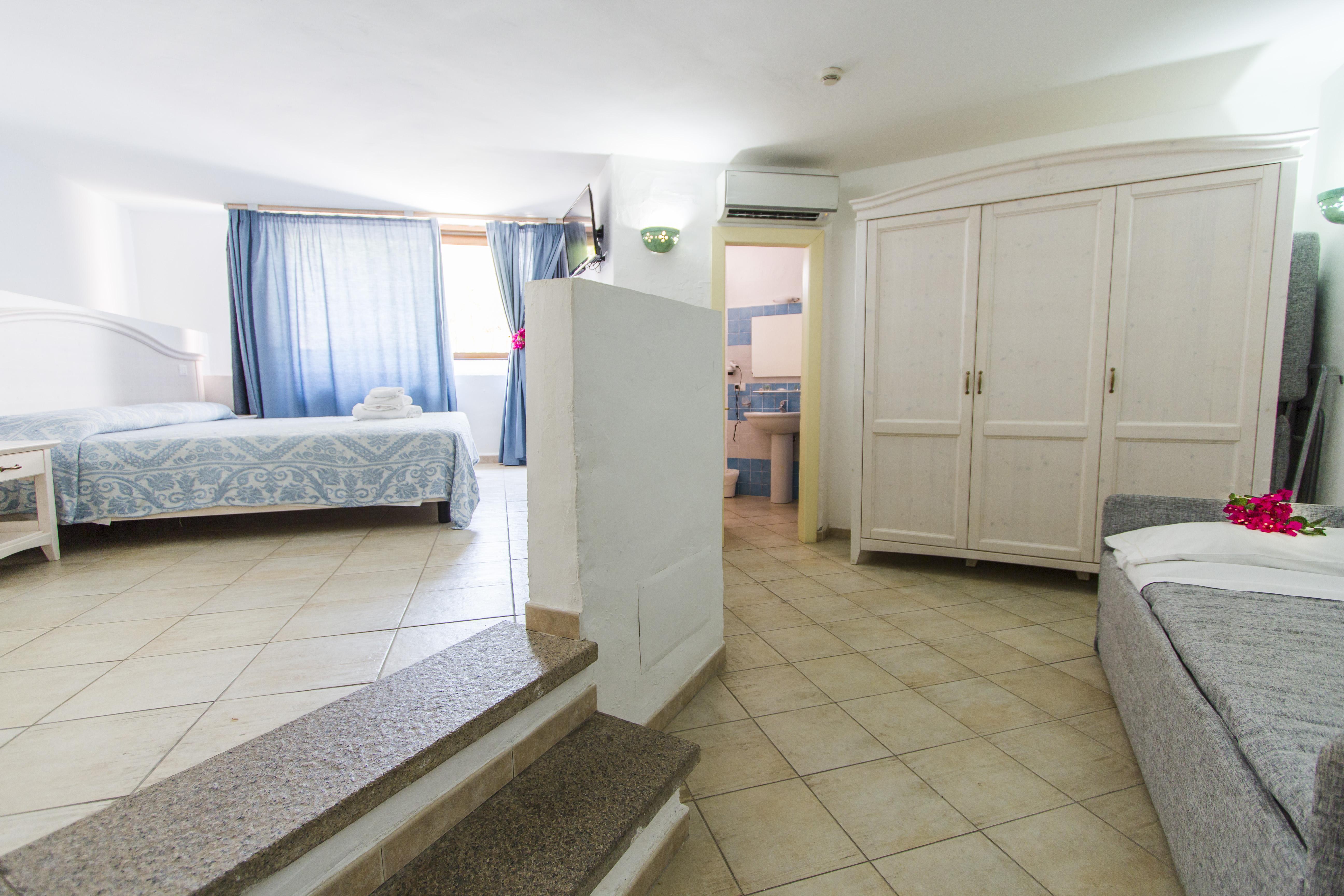Hotel Li Graniti Baja Sardinia Buitenkant foto