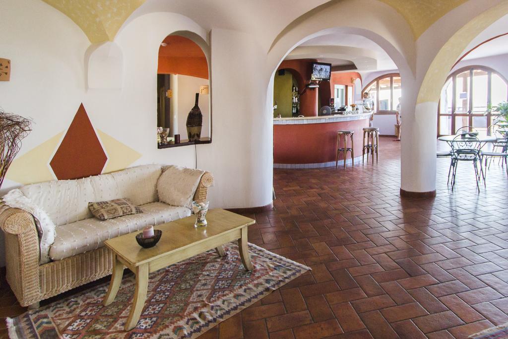 Hotel Li Graniti Baja Sardinia Buitenkant foto
