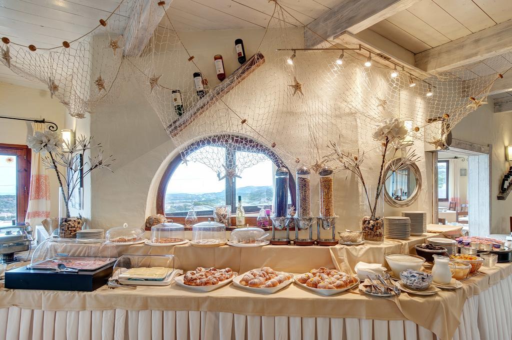 Hotel Li Graniti Baja Sardinia Buitenkant foto