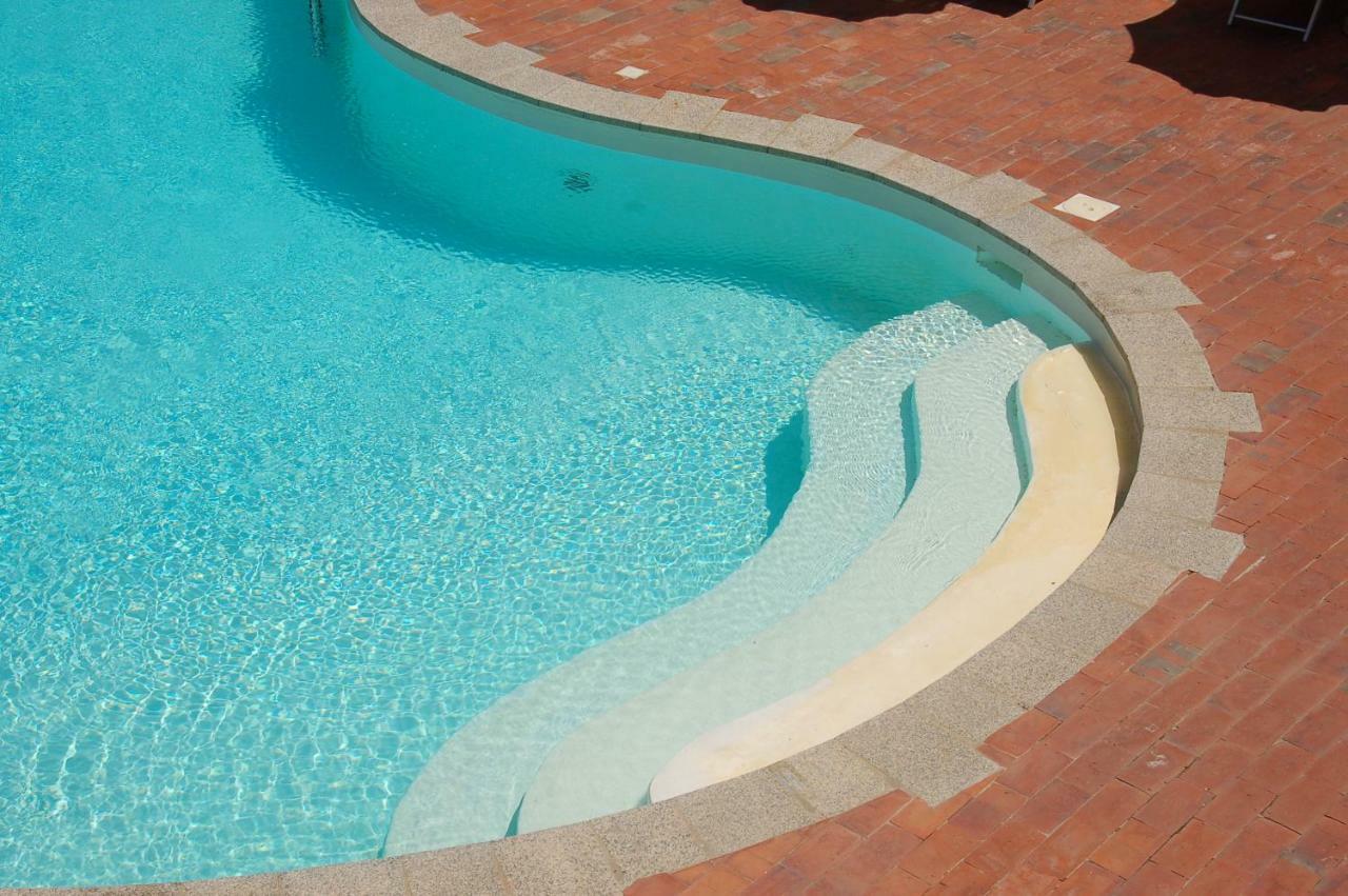 Hotel Li Graniti Baja Sardinia Buitenkant foto